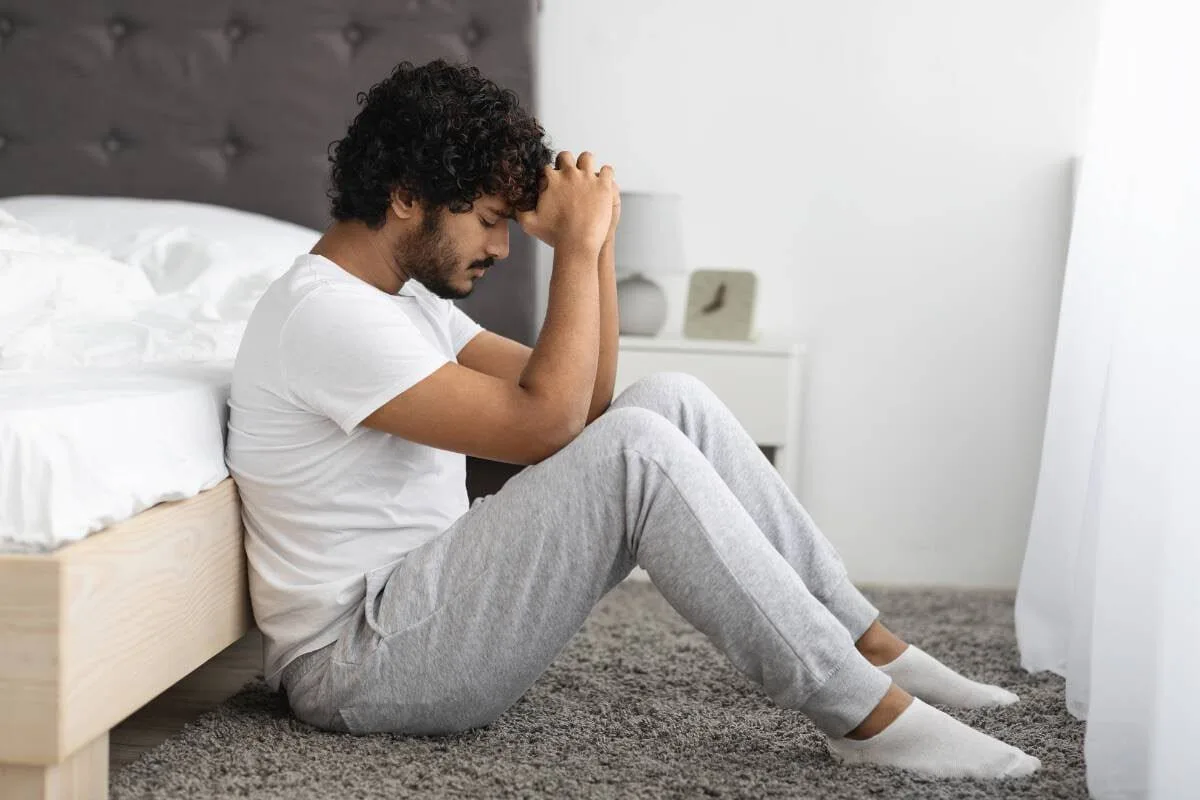 stresses indian men on bed
